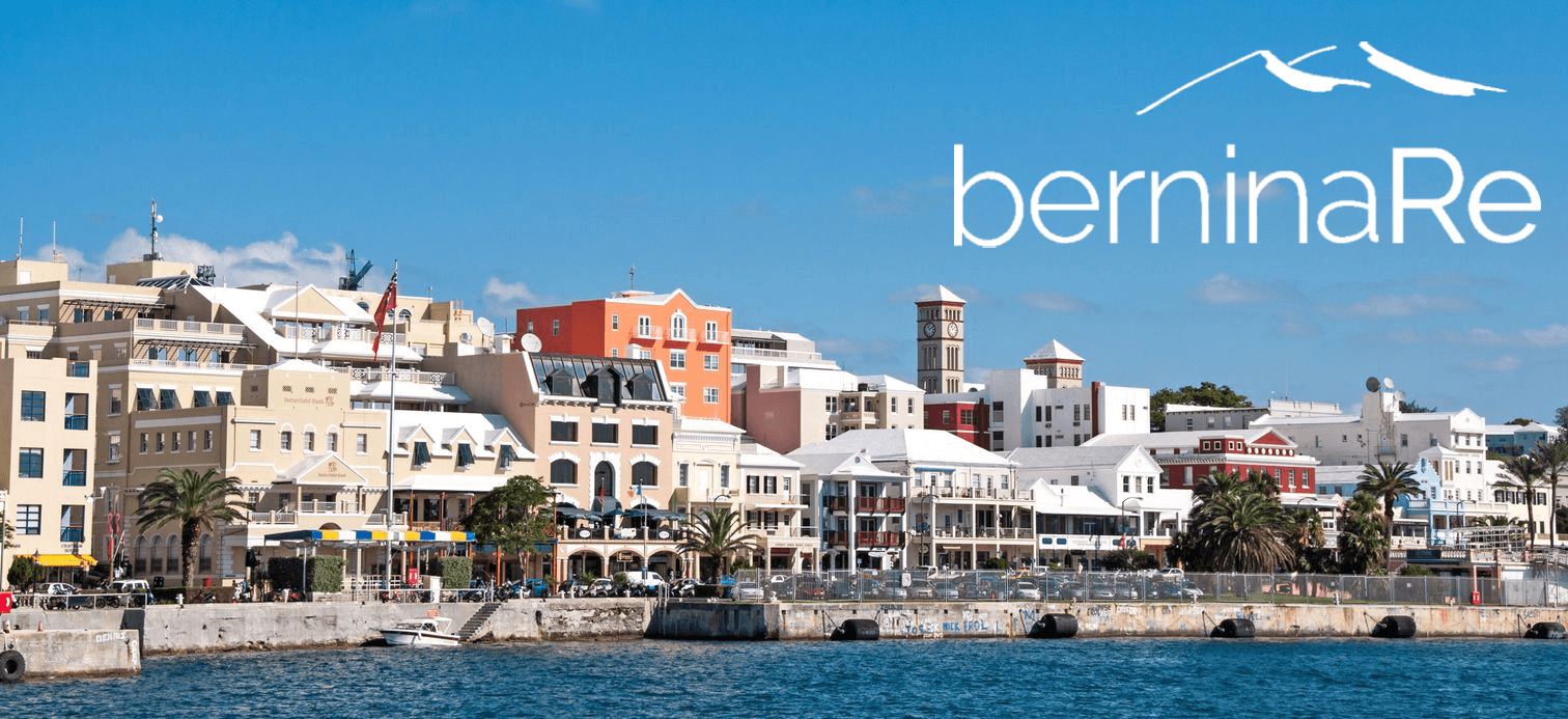 A scenic view of the waterfront in Hamilton, Bermuda, featuring colorful buildings and the BerninaRe logo in the upper right corner.